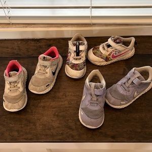 Three pairs of Nike toddler girl sneakers